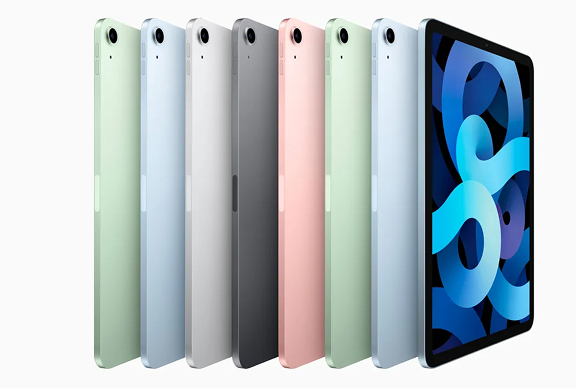 Seven tablets shown in various colors including green, blue, gray, black, and pink, arranged side by side with one tablet displaying a blue abstract screen.